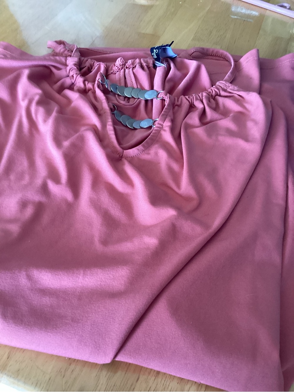 Pink Off-Shoulder Top with Decorative Disc Accents